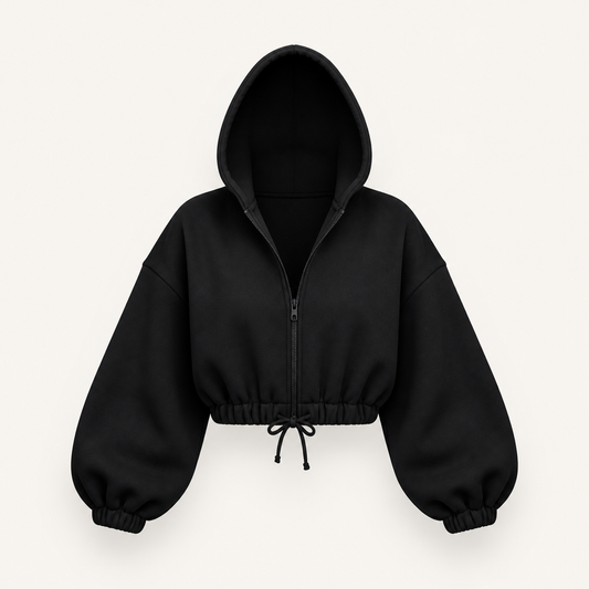 ブラックのクロップド ジップアップフーディ。無人の商品正面画像。